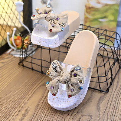 Jauns sieviešu čību modelis ar lentīti un akmentiņiem