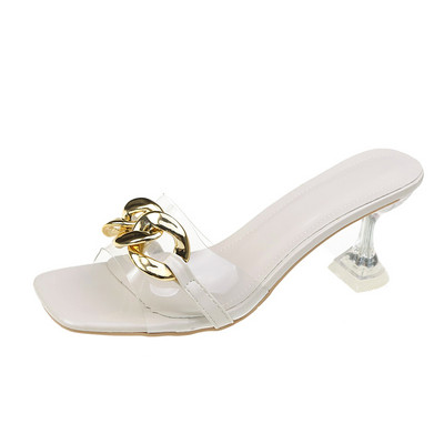 Κομψές γυναικείες παντόφλες με διάφανό τακούνι και αγκράφα