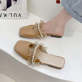 Sieviešu ādas čības ar pērlēm un lokām