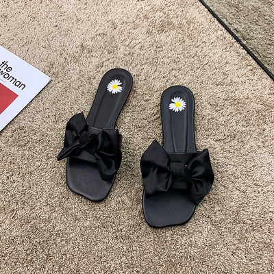 Stilīgas sieviešu čības ar plakanu zoli un lentīti