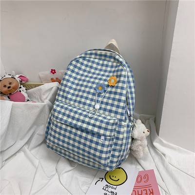 Sieviešu rūtainā mugursoma ar lācīša aksesuāru