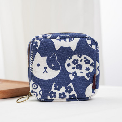 Γυναικείο μίνι πορτοφόλι με φερμουάρ και πολύχρωμες εφαρμογές