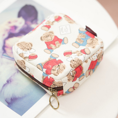 Γυναικείο μίνι πορτοφόλι με φερμουάρ και πολύχρωμες εφαρμογές