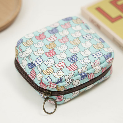 Γυναικείο μίνι πορτοφόλι με φερμουάρ και πολύχρωμες εφαρμογές