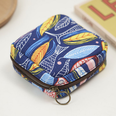 Γυναικείο μίνι πορτοφόλι με φερμουάρ και πολύχρωμες εφαρμογές