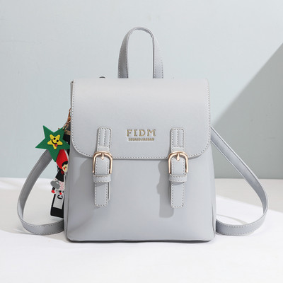 Γυναικείο σακίδιο οικολογικού δέρματος με μεταλλική αγκράφα