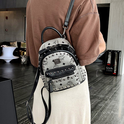 Νέο σακίδιο μικρού μεγέθους κατασκευασμένο από οικολογικό δέρμα με μαργαριτάρια και μεταλλικά πούλια