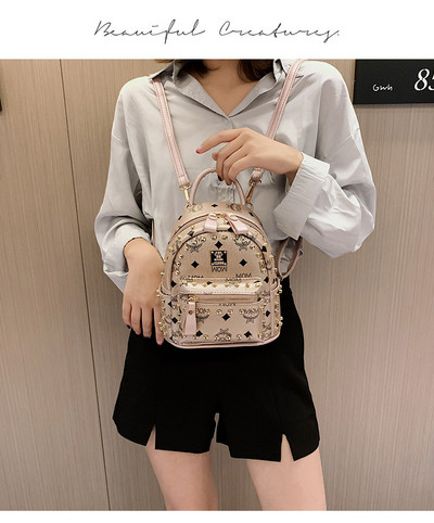 Νέο σακίδιο μικρού μεγέθους κατασκευασμένο από οικολογικό δέρμα με μαργαριτάρια και μεταλλικά πούλια