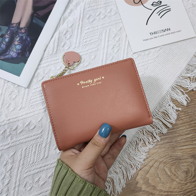 Γυναικείο πορτοφόλι από οικολογικό δέρμα με επιγραφή