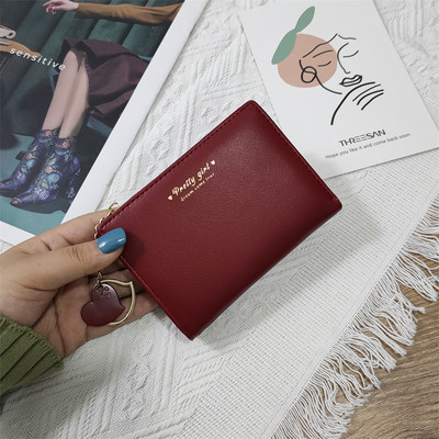 Γυναικείο πορτοφόλι από οικολογικό δέρμα με επιγραφή