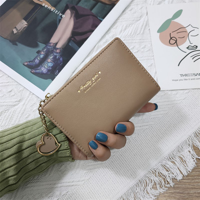 Γυναικείο πορτοφόλι από οικολογικό δέρμα με επιγραφή