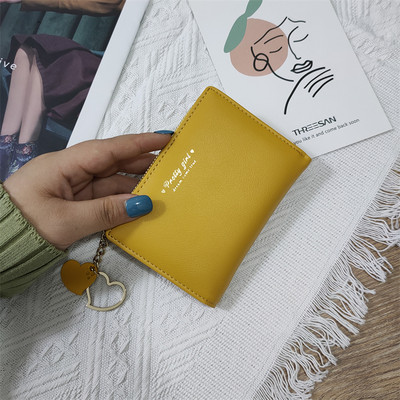 Γυναικείο πορτοφόλι από οικολογικό δέρμα με επιγραφή