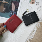 Sieviešu ādas somiņa ar uzrakstiem