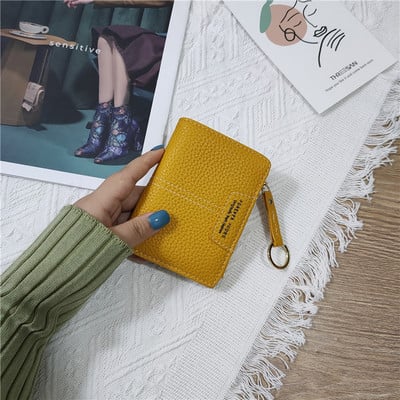 Sieviešu ādas somiņa ar uzrakstiem