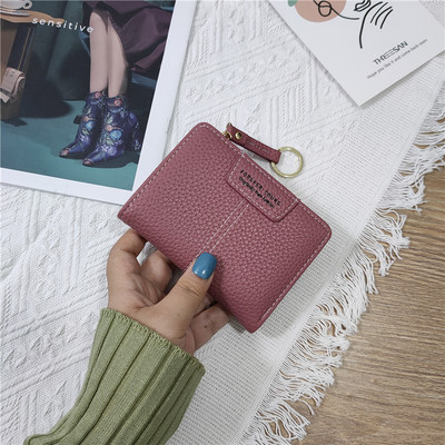 Sieviešu ādas somiņa ar uzrakstiem