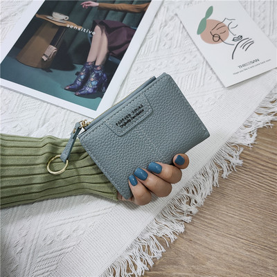 Sieviešu ādas somiņa ar uzrakstiem