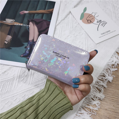 Γυναικείο γυαλιστερό πορτοφόλι με φερμουάρ και επιγραφή