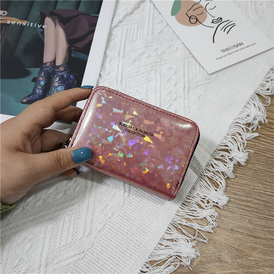 Γυναικείο γυαλιστερό πορτοφόλι με φερμουάρ και επιγραφή