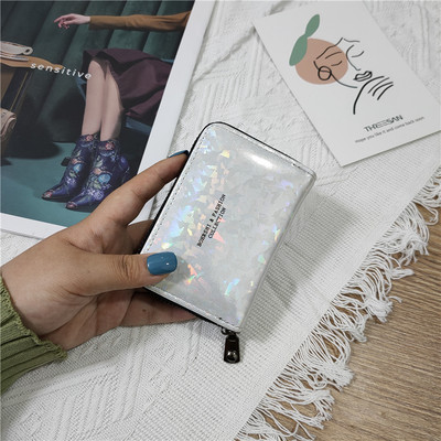 Γυναικείο γυαλιστερό πορτοφόλι με φερμουάρ και επιγραφή