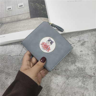 Γυναικείο πορτοφόλι με φερμουάρ και τύπωμα