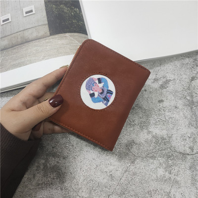 Γυναικείο πορτοφόλι με φερμουάρ και τύπωμα