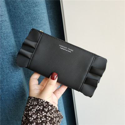 Γυναικείο πορτοφόλι από οικολογικό δέρμα με βολάν