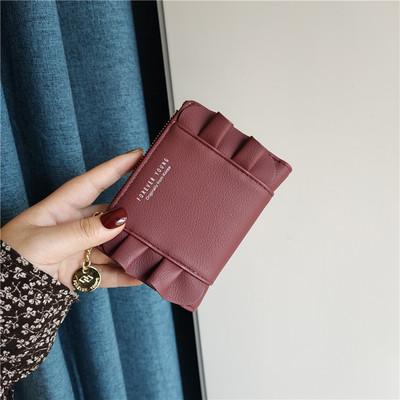 Νέο μοντέλο γυναικείο πορτοφόλι με βολάν και επιγραφή