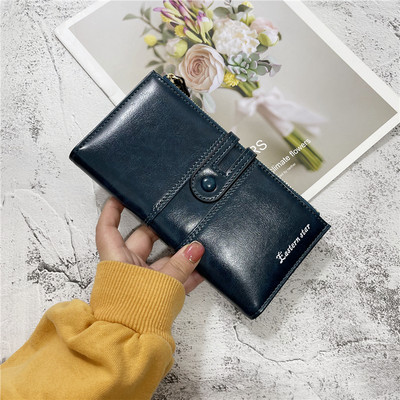 Moderni moteriška piniginė iš eko odos su užtrauktuku ir užsegimu