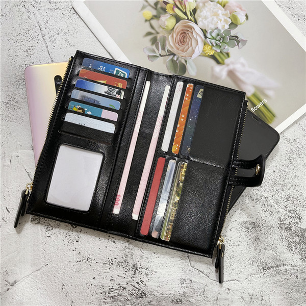 Moderni moteriška piniginė iš eko odos su užtrauktuku ir užsegimu