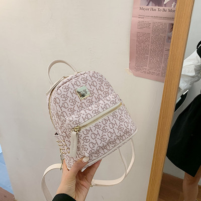 Μοντέρνα μίνι τσάντα από οικολογικό δέρμα με επιγραφές