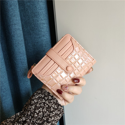 Moteriška keturių spalvų odinė piniginė