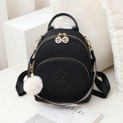 Γυναικείο σακίδιο οικολογικού δέρματος με φερμουάρ και μπρελόκ