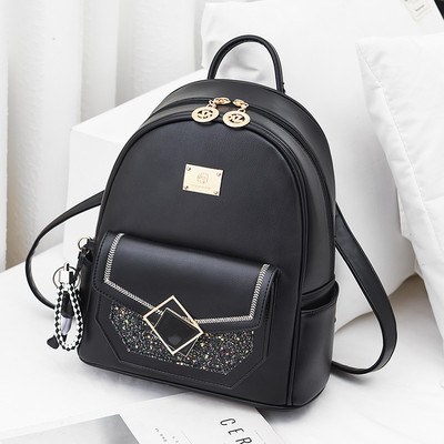 Γυναικείο σακίδιο με μεταλλικό στοιχείο και λαμπερά μοτίβα δύο μεγεθών