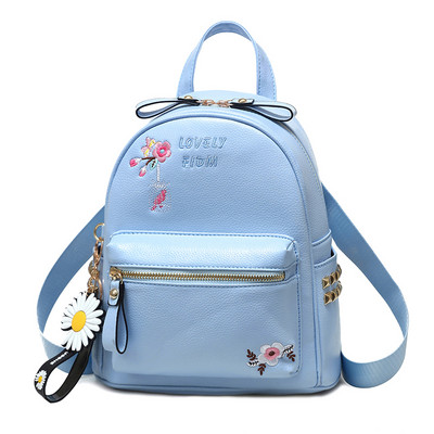 Γυναικείο σακίδιο με κεντήματα και μεταλλικά πριτσίνια