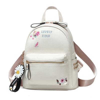 Γυναικείο σακίδιο με κεντήματα και μεταλλικά πριτσίνια