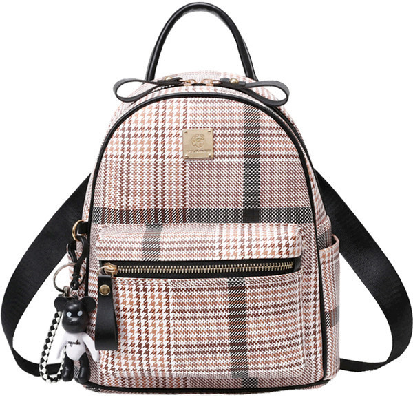 Дамска раница с метален елемент и странични джобове