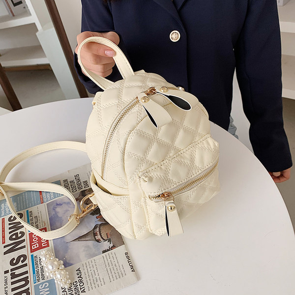 Капитонирана дамска раница от еко кожа - мини размер