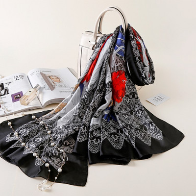 Κομψό γυναικείο κασκόλ κατάλληλο για καλοκαίρι με λουλουδάτη διακόσμηση