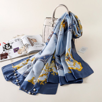 Κομψό γυναικείο κασκόλ κατάλληλο για καλοκαίρι με λουλουδάτη διακόσμηση