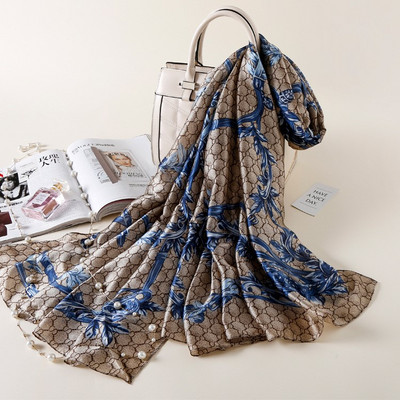 Κομψό γυναικείο κασκόλ κατάλληλο για καλοκαίρι με λουλουδάτη διακόσμηση