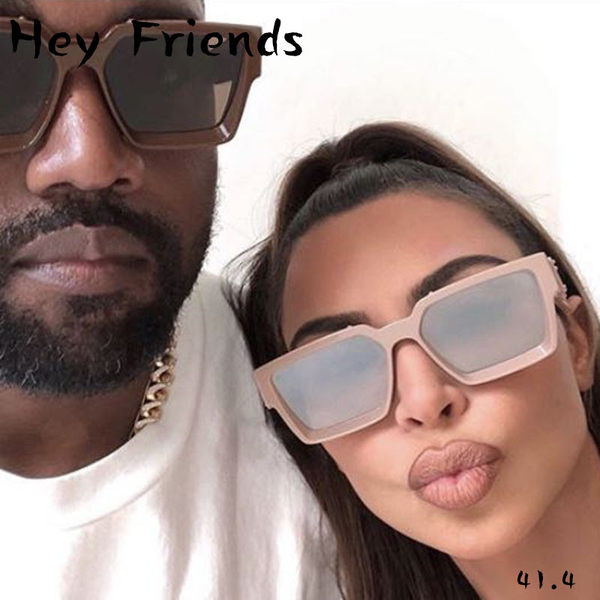 Pašreizējās saulesbrilles unisex modelī ar taisnstūra formu