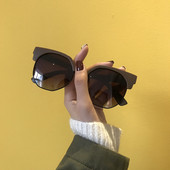 Ochelari eleganti de dama in forma rotunda