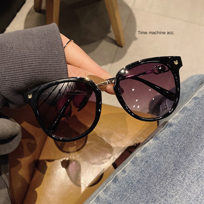 Γυναικεία γυαλιά με στρογγυλό σχήμα και μεταλλικό στοιχείο