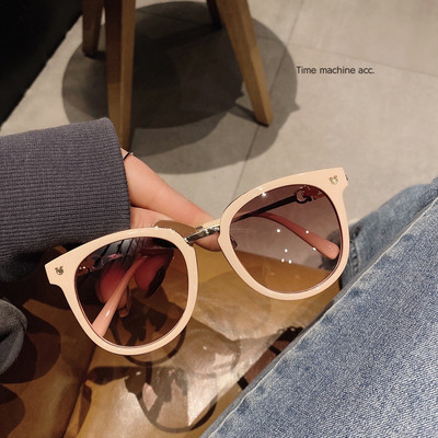 Γυναικεία γυαλιά με στρογγυλό σχήμα και μεταλλικό στοιχείο