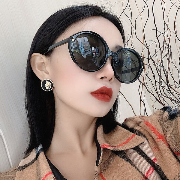 Sieviešu apaļas modernas saulesbrilles ar plānu rāmi