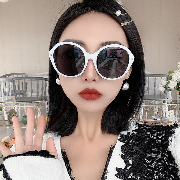 Sieviešu apaļas modernas saulesbrilles ar plānu rāmi
