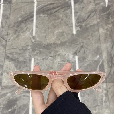 Jauns sieviešu saulesbriļļu modelis ar plānu rāmi