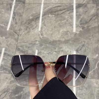 Jauns sieviešu saulesbriļļu modelis ar plānu rāmi