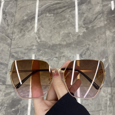 Jauns sieviešu saulesbriļļu modelis ar plānu rāmi