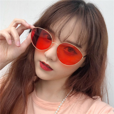 Μοντέρνα γυναικεία στρογγυλά γυαλιά με λεπτό σκελετό